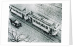 Urban traffic during snowfall, historic photo by Anonymous