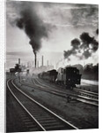 Freight train in front of smoking chimney stacks, nostalgia by Anonymous
