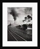 Freight train in front of smoking chimney stacks, nostalgia by Anonymous