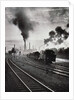 Freight train in front of smoking chimney stacks, nostalgia by Anonymous