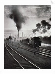 Freight train in front of smoking chimney stacks, nostalgia by Anonymous