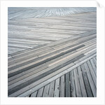 High angle view of wooden deck with planks set at an angle by Anonymous