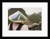 Tourist Wearing Illustrated Conical Hat on the Great Wall by Anonymous