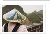 Tourist Wearing Illustrated Conical Hat on the Great Wall by Anonymous