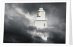 Lighthouse Emerging From Dark Clouds by Anonymous