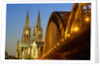Cologne Cathedral and Hohenzollern Bridge on Rhine River by Anonymous