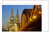 Cologne Cathedral and Hohenzollern Bridge on Rhine River by Anonymous