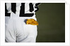 Referee with Penalty Flag in Pocket by Anonymous