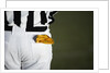 Referee with Penalty Flag in Pocket by Anonymous
