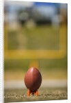 Football on Tee by Anonymous