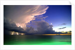 Lighting striking over green and blue water by Anonymous