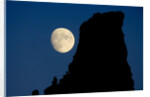 Full Moon Beside Rock by Anonymous