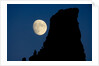Full Moon Beside Rock by Anonymous