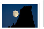 Full Moon Beside Rock by Anonymous