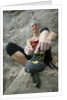 Woman Putting on Rock Climbing Shoes by Anonymous