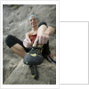 Woman Putting on Rock Climbing Shoes by Anonymous