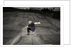 Skateboarder Performing Tricks by Anonymous