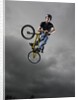 BMX Biker Performing Tricks by Anonymous