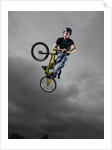 BMX Biker Performing Tricks by Anonymous