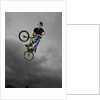 BMX Biker Performing Tricks by Anonymous