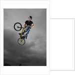 BMX Biker Performing Tricks by Anonymous