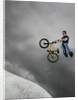 BMX Biker Performing Tricks by Anonymous