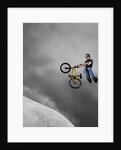 BMX Biker Performing Tricks by Anonymous