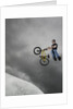 BMX Biker Performing Tricks by Anonymous