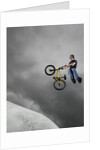 BMX Biker Performing Tricks by Anonymous