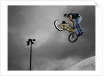BMX Biker Performing Tricks by Anonymous