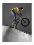 BMX Biker Performing Tricks by Anonymous