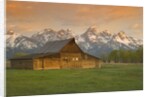 Log Barn in Meadow near Mountain Range by Anonymous