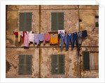 Laundry Hanging Outside Windows by Anonymous