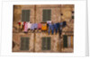 Laundry Hanging Outside Windows by Anonymous