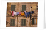 Laundry Hanging Outside Windows by Anonymous