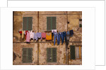 Laundry Hanging Outside Windows by Anonymous