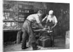 Blacksmiths at Work by Anonymous