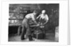 Blacksmiths at Work by Anonymous