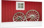 Wagon Wheels on Snow Against Stable by Anonymous