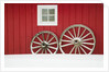 Wagon Wheels on Snow Against Stable by Anonymous