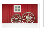 Wagon Wheels on Snow Against Stable by Anonymous