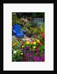 Backyard Flower Garden With Chair by Anonymous
