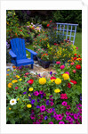 Backyard Flower Garden With Chair by Anonymous