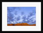 Cumulus Clouds Over Sandstone Buttes at Sunrise by Anonymous