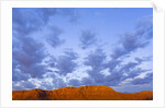 Cumulus Clouds Over Sandstone Buttes at Sunrise by Anonymous