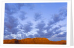 Cumulus Clouds Over Sandstone Buttes at Sunrise by Anonymous