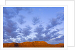 Cumulus Clouds Over Sandstone Buttes at Sunrise by Anonymous