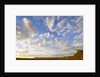 Cumulus Clouds Over Sandstone Buttes at Sunrise by Anonymous