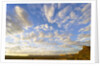 Cumulus Clouds Over Sandstone Buttes at Sunrise by Anonymous