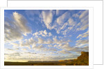 Cumulus Clouds Over Sandstone Buttes at Sunrise by Anonymous